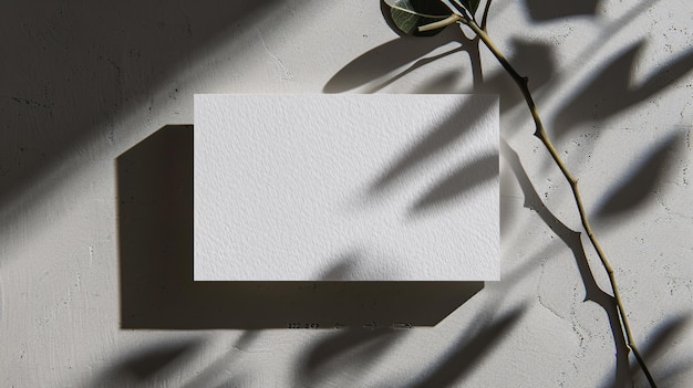 Textured business card mockup on a grey background