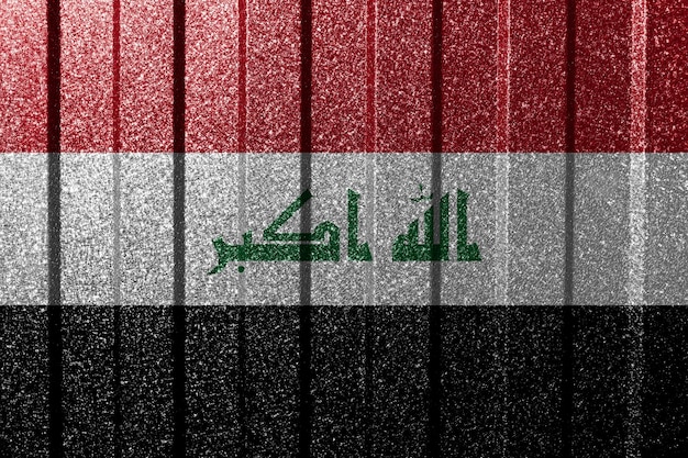 Textured flag of Iraq on metal wall Colorful natural abstract geometric background with lines