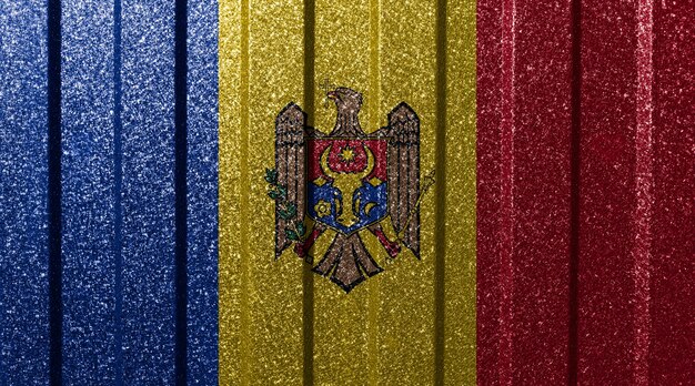 Textured flag of Moldova on metal wall Colorful natural abstract geometric background with lines