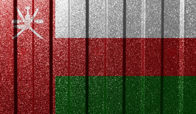 Текстурированный флаг Омана на металлической стене Красочный естественный абстрактный геометрический фон с линиями