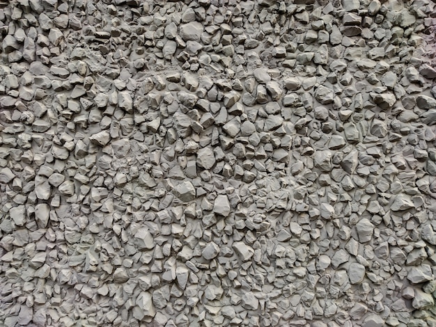 Textured gray background made of fine stone