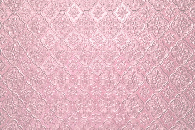 Textured pale pink light background with a pattern painted glass in vintage style wall