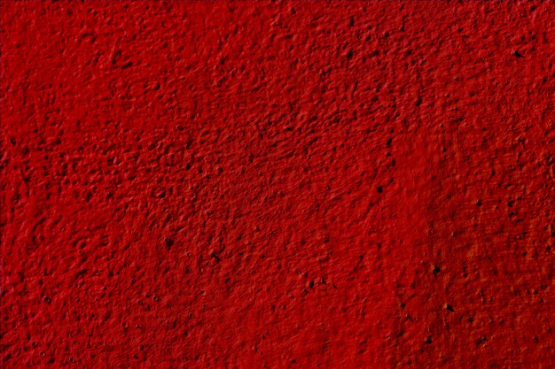 Foto sfondo rosso texturato del gesso per pareti