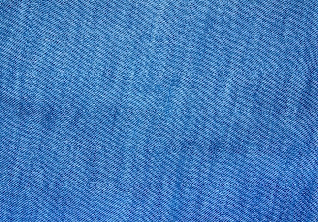 Textured striped blue denim fabric surface