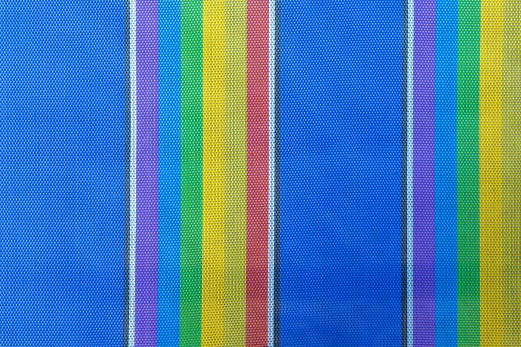 Texturen en kleuren van strandstoel voor de achtergrond.