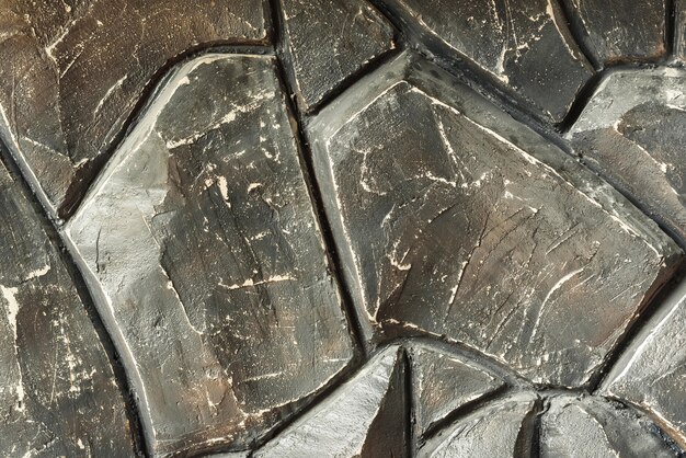 Foto textuur achtergrond bruin donker stenen stucwerk grunge