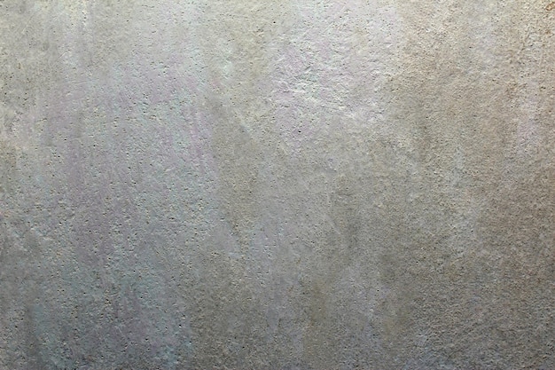Textuur betonnen wand in grijze en gele tint