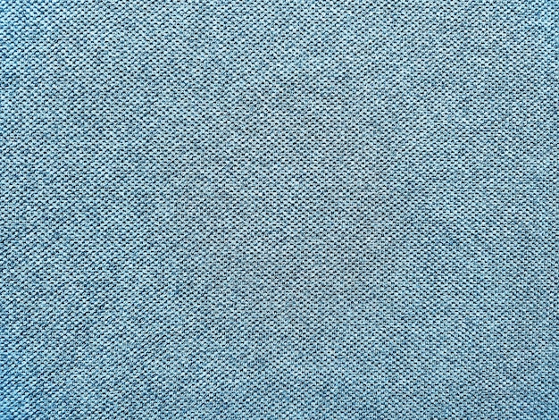 Textuur en achtergrond van blauw sportkledingstofvoetbalshirt