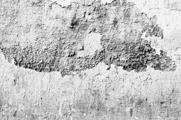 Textuur, muur, beton. Muurfragment met krassen en scheuren