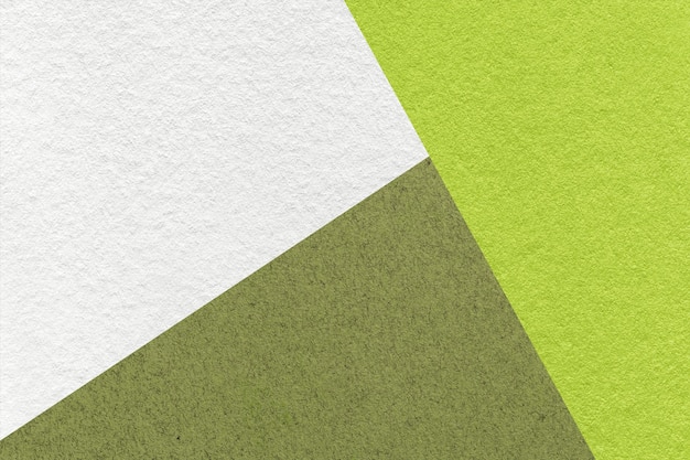 Textuur van ambachtelijke wit groen en olijf schaduw kleur papier achtergrond Structuur van vintage abstract karton