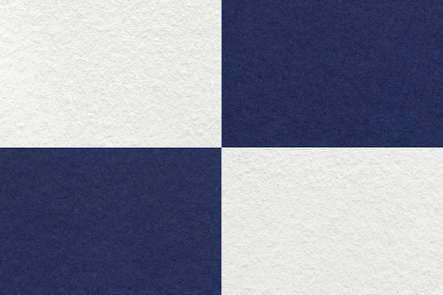 Textuur van ambachtelijke witte en marineblauwe papieren achtergrond met cellenpatroon Structuur van vintage kraft-denimkarton