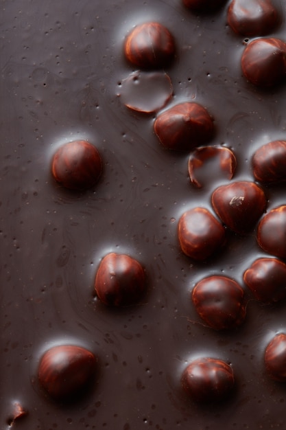 textuur van chocolade met noten macro. Voedsel achtergrond