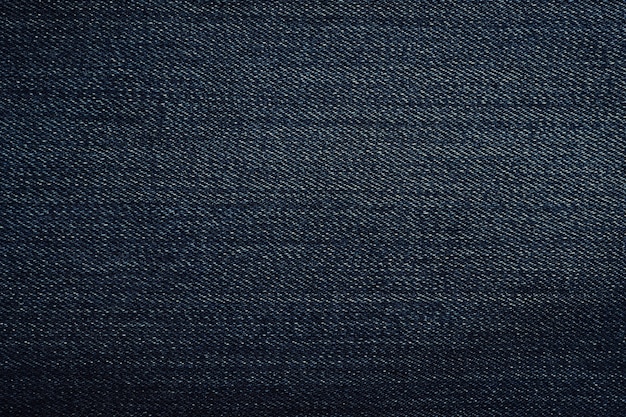 Textuur van de blauwe achtergrond van denimjeans