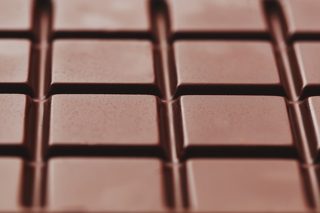 Textuur van donkere chocolade dichte omhooggaand.