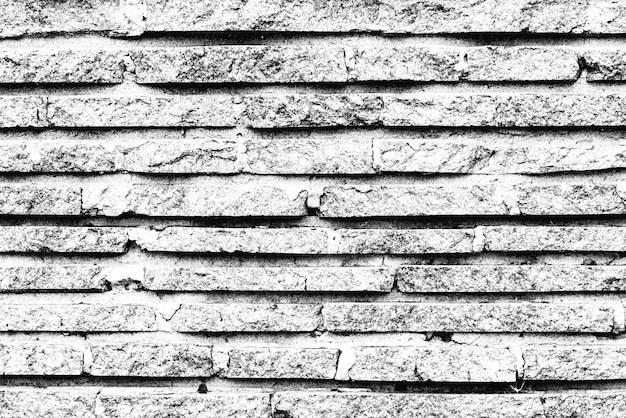 Textuur van een bakstenen muur met scheuren en krassen die als achtergrond kunnen worden gebruikt