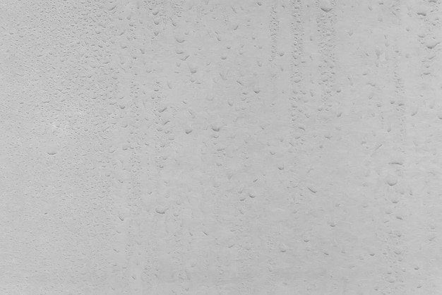 Textuur van een druppel regen op een glas natte transparante achtergrond