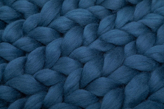 Textuur van gebreide natuurlijke wol in blauw