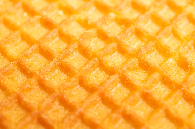 Textuur van gele wafel close-up achtergrond voor tekst
