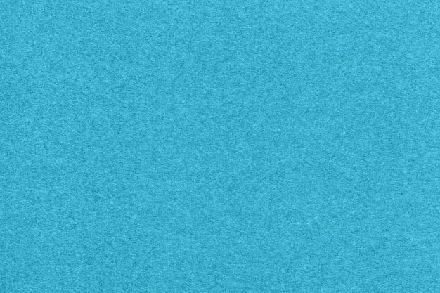 Textuur van lichtblauwe en turquoise kleuren papier achtergrond macro Structuur van dicht cerulean ambachtelijk karton