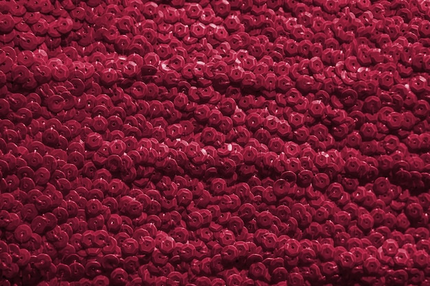 Textuur van macrofoto van kleuren de roze lovertjes. Nieuwe 2023 trending PANTONE 18-1750 Viva Magenta kleur