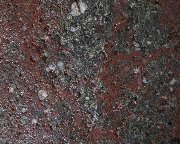 Textuur van natuursteen met aderen van graniet, geologie.