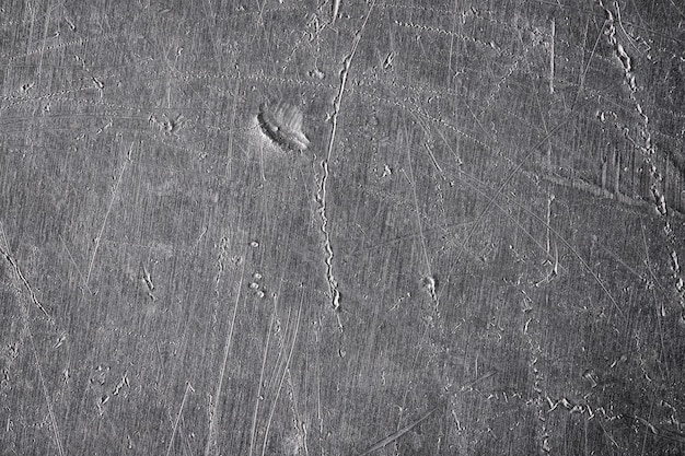 Foto textuur van oud metaal met krassen en scheuren. zilveren plaat metalen achtergrond