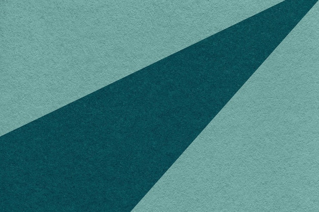 Textuur van oude ambacht cyaan en smaragd kleur papier achtergrond macro Structuur van vintage abstract groenblauw karton