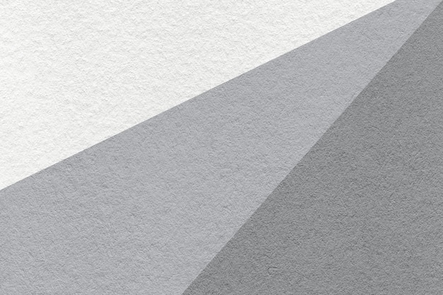 Textuur van oude ambachtelijke witte en grijze kleur papier achtergrond macro Vintage abstract grijs karton met verloop