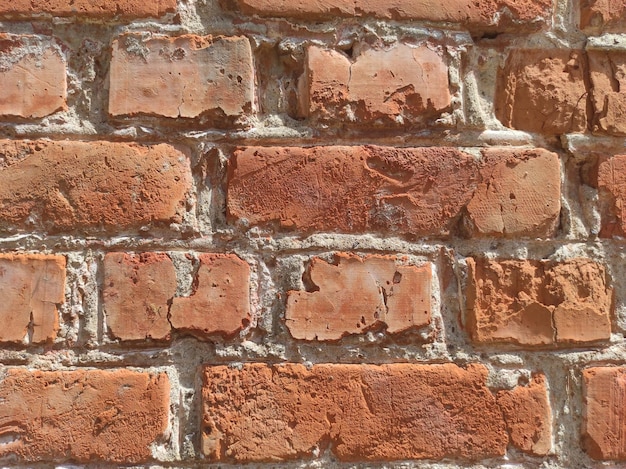 Textuur van oude verweerde baksteen Achtergrond van oude rode bakstenen