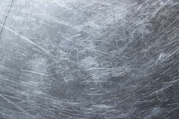 Textuur van roestvrij staalbehang, achtergrond van metaal met slijtage