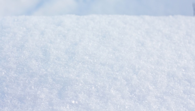 Textuur van sneeuw bij zonnig weer. Achtergrond - sneeuw oppervlak_