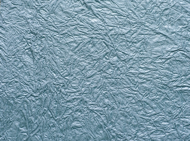 Textuur van verfrommeld blauw papier