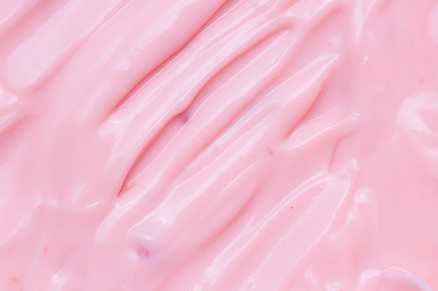 Textuur yoghurt macroclose-up roze romige zelfgemaakte