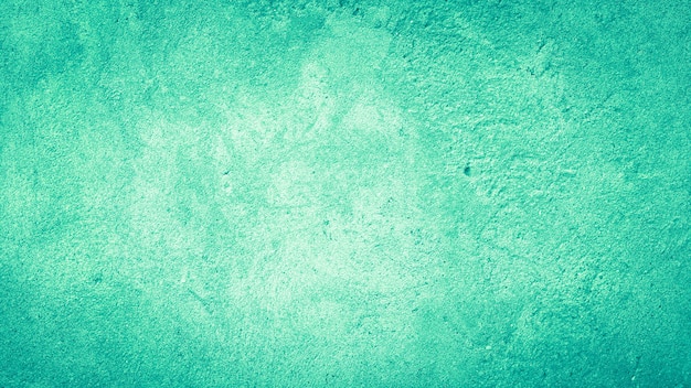 Textuurachtergrond van muurbeton blauw groen pastelkleuren