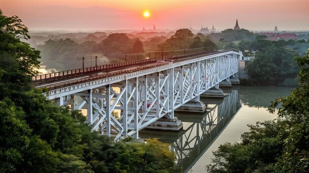 Photo thachomphu railway bridge or white bridge at sunrise in lamphun thailand