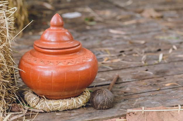 Thai antique clay pot earth ware for guest or visitor drinking water