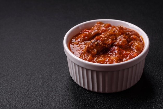 thai asian dish with meat hot pepper tomato sauce and sesame