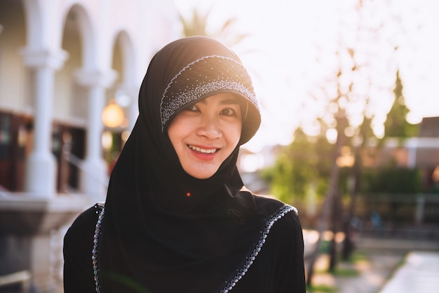 Thai Asian Muslim woman are praying for the blessing of God, woman portrait islam, songkhla province thailand.