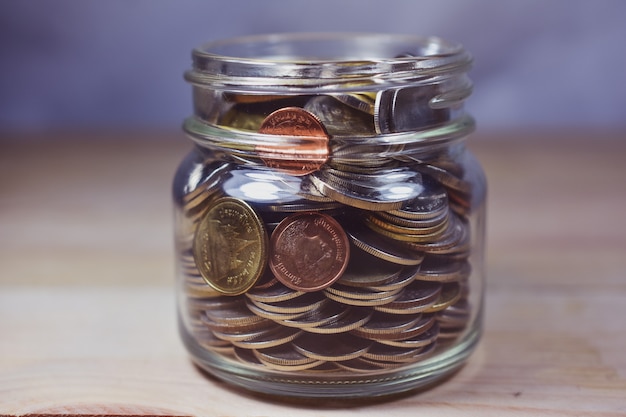 Thai baht coins in jar