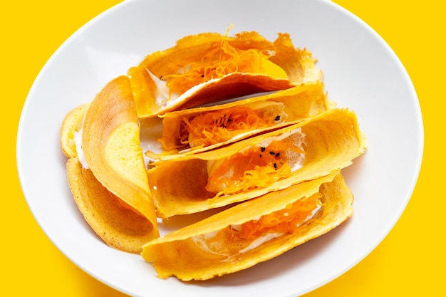 Thai crispy pancakes on white background