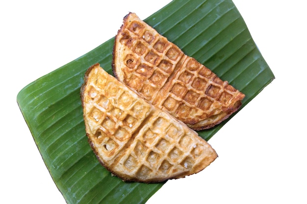 Thai dessert made with rice flour mixed with sugar and jaggery and grated coconut