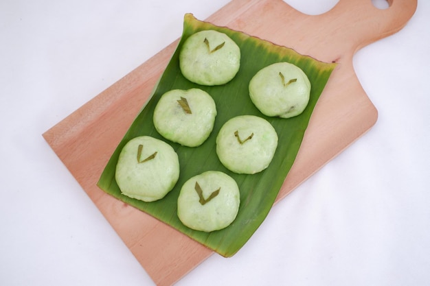 Thai dessert steamed glutinous rice cake on wooden plate