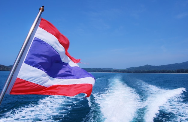 Thai flag and the sea with blue sky 