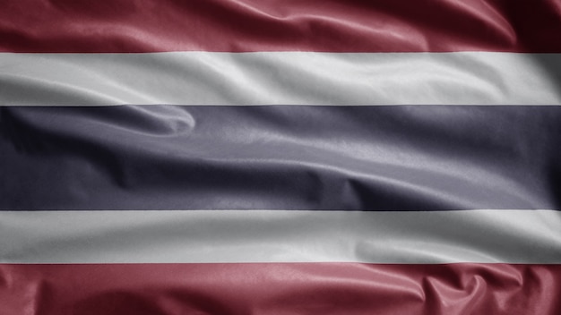 Thai flag waving in the wind. Close up of Thailand template blowing, soft and smooth silk. Cloth fabric texture ensign background.