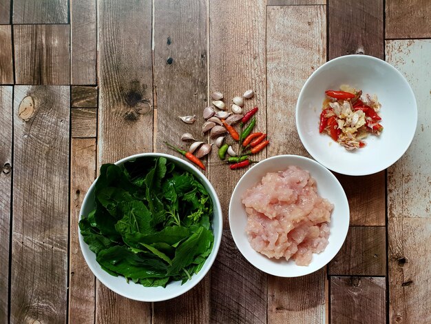 Thai food Ingredient cooking menu of Fried minced chicken with chili and basil leaf