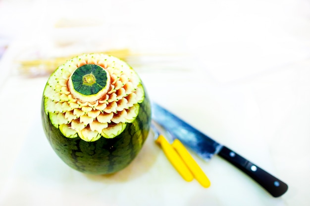 Thai fruit carving with hand, Vegetable and Fruit Carving