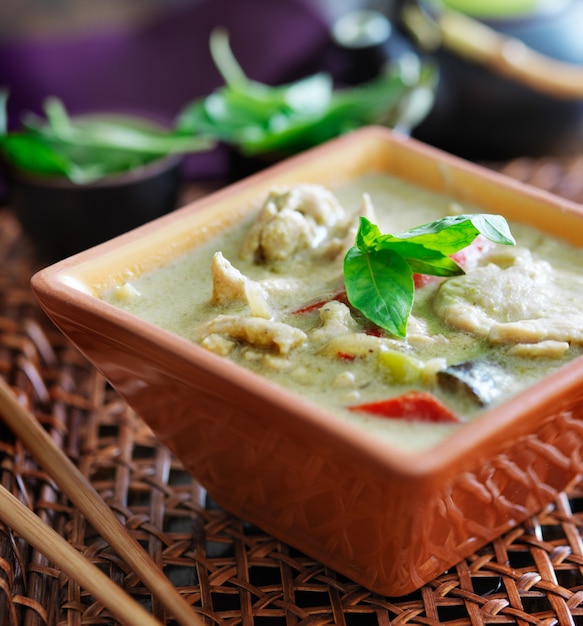 Thai green curry with chicken in a bowl