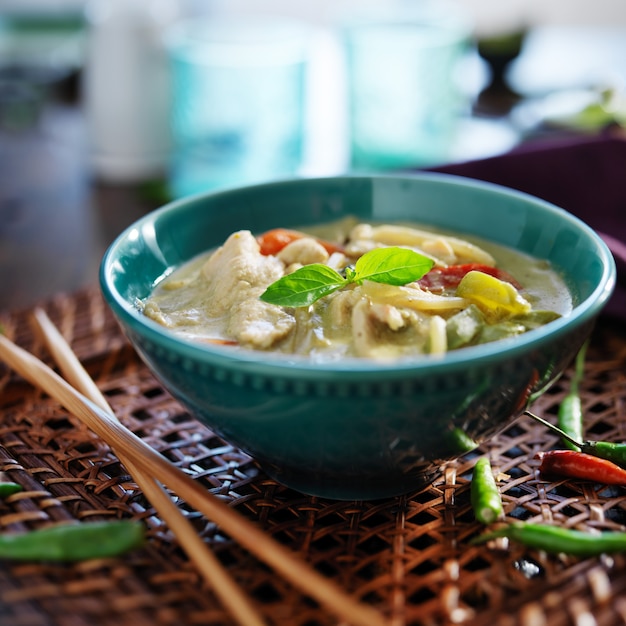 Thai green curry with chicken in a bowl