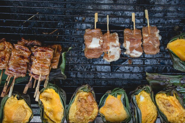 Thai Khai Pam or Grilled eggs with banana leaf on local of northern Thailand.