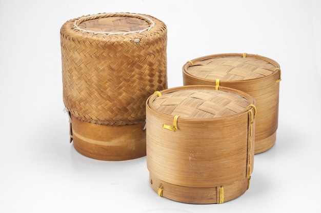 Thai laos bamboo sticky rice container on a white